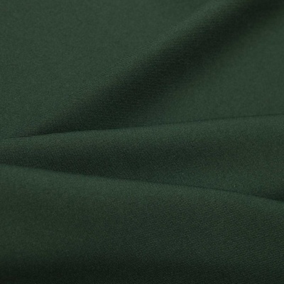 Ткань костюмная 21010 2076, 225 гр/м2, шир.150см, цвет т.зеленый - купить в Новочебоксарске. Цена 390.73 руб.